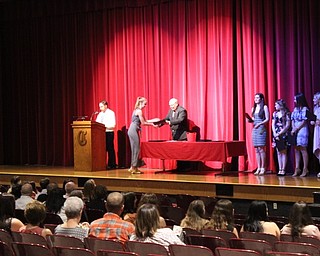 Neighbors | Abby Slanker.Canfield High School junior Grace Mangapora accepted her certificate from principal Mike Moldovan during the Parent Teacher Association Academic Awards Program on May 2.