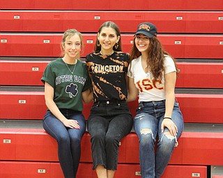 Neighbors | Abby Slanker.Canfield High School seniors, from left, Alexis Bernat, Clare Crescimanno and Julia Petrallo committed to their universities of choice on National College Decision Day on May 1. Bernat will attend University of Notre Dame, Crescimanno will attend Princeton University and Petrallo will attend University of Southern California.
