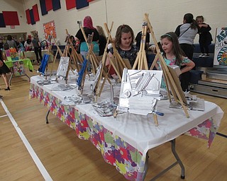 Neighbors | Jessica Harker.Community members gathered at Austintown Elementary School's gym May 7 for the schools annual Second Grade Art Show.
