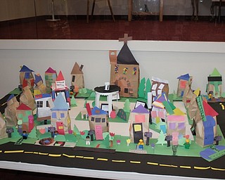 Neighbors | Abby Slanker.Students in the Canfield United Methodist Preschool pre-k class worked together to create a Family Neighborhood, which was on display at the school’s annual art show on May 9.