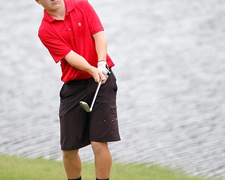 Tyler Andersen, 16, of Columbiana, hits the ball during the Greatest Golfer junior qualifiers at Reserve Run Golf Course on Thursday. EMILY MATTHEWS | THE VINDICATOR