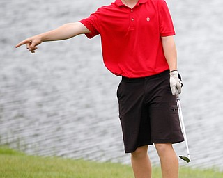 Tyler Andersen, 16, of Columbiana, reacts after hitting the ball near the hole during the Greatest Golfer junior qualifiers at Reserve Run Golf Course on Thursday. EMILY MATTHEWS | THE VINDICATOR