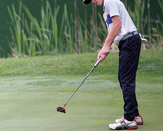 Conor Daggett, 14, of Canfield, puts the ball during the Greatest Golfer junior qualifiers at Reserve Run Golf Course on Thursday. EMILY MATTHEWS | THE VINDICATOR