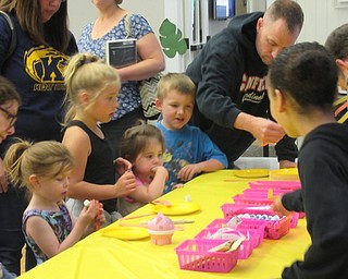 Neighbors | Jessica Harker .Children worked on crafts and played games at the Canfield library's Safari Party on June 13.