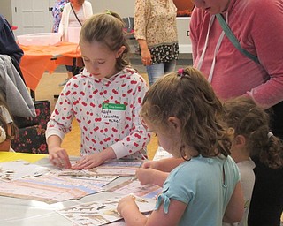 Neighbors | Jessica Harker .Families gathered at the Canfield library on June 13 and made lion masks to celebrate the upcoming release of the new "Lion King" movie.