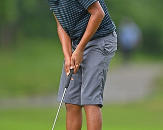 BOARDMAN, OHIO - JUNE 20, 2019: Asher Joseph. of Melbourne, Florida, watches his putt on the 18th hole during the final round of the American Junior Golf Association Tournament. DAVID DERMER | THE VINDICATOR