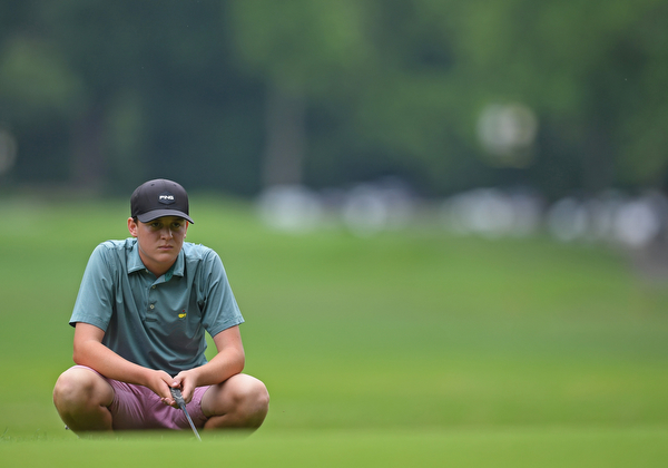 BOARDMAN, OHIO - JUNE 20, 2019: Jackson Finney, of Louisville, Kentucky, reads the green on the 17th hole during the final round of the American Junior Golf Association Tournament. DAVID DERMER | THE VINDICATOR