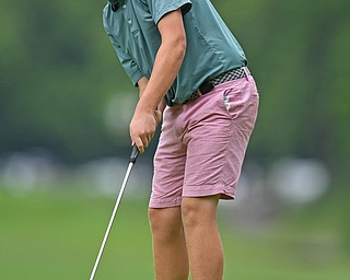 BOARDMAN, OHIO - JUNE 20, 2019: Jackson Finney, of Louisville, Kentucky, watches his putt on the 17th hole during the final round of the American Junior Golf Association Tournament. DAVID DERMER | THE VINDICATOR