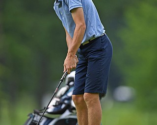 BOARDMAN, OHIO - JUNE 20, 2019: Jackson Hill, of Madisonville, Kentucky, watches his putt on the 17th hole during the final round of the American Junior Golf Association Tournament. DAVID DERMER | THE VINDICATOR