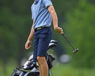 BOARDMAN, OHIO - JUNE 20, 2019: Jackson Hill, of Madisonville, Kentucky, reacts while watching his putt on the 17th hole during the final round of the American Junior Golf Association Tournament. DAVID DERMER | THE VINDICATOR