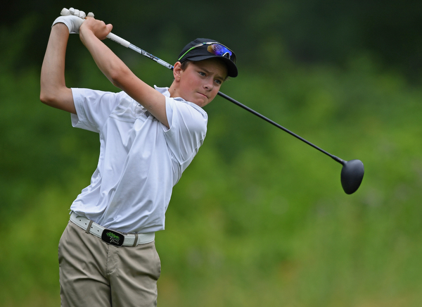 BOARDMAN, OHIO - JUNE 20, 2019: BOARDMAN, OHIO - JUNE 20, 2019: Alex Long. of Toronto, Ontario, watches his tee shot on the 18th hole during the final round of the American Junior Golf Association Tournament. DAVID DERMER | THE VINDICATOR