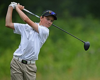 BOARDMAN, OHIO - JUNE 20, 2019: BOARDMAN, OHIO - JUNE 20, 2019: Alex Long. of Toronto, Ontario, watches his tee shot on the 18th hole during the final round of the American Junior Golf Association Tournament. DAVID DERMER | THE VINDICATOR