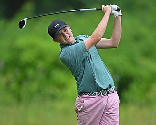 BOARDMAN, OHIO - JUNE 20, 2019: Jackson Finney, of Louisville, Kentucky, watches his tee shot on the 18th hole during the final round of the American Junior Golf Association Tournament. DAVID DERMER | THE VINDICATOR