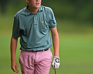 BOARDMAN, OHIO - JUNE 20, 2019: Jackson Finney, of Louisville, Kentucky, watches his approach shot on the 18th hole during the final round of the American Junior Golf Association Tournament. DAVID DERMER | THE VINDICATOR