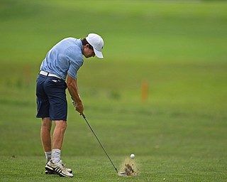 BOARDMAN, OHIO - JUNE 20, 2019: Jackson Hill, of Madisonville, Kentucky, hits his approach shot on the 18th hole during the final round of the American Junior Golf Association Tournament. DAVID DERMER | THE VINDICATOR