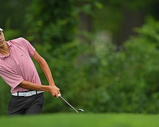 BOARDMAN, OHIO - JUNE 20, 2019: Andres Barraza, of Parkland, Florida, watches his chip shot on the 17th hole during the final round of the American Junior Golf Association Tournament. DAVID DERMER | THE VINDICATOR
