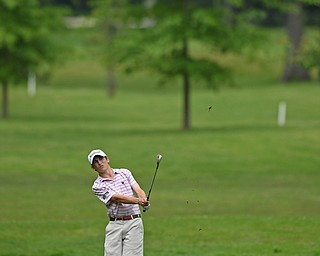 BOARDMAN, OHIO - JUNE 20, 2019: Will Lodge, of Darien, Connecticut, watches his approach shot on the 18th hole during the final round of the American Junior Golf Association Tournament. DAVID DERMER | THE VINDICATOR