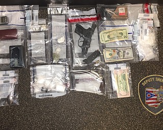 Agents with TAG Drug Task Force on Thursday executed a search warrant on a known drug house distributing crystal methamphetamine at 6451 Yoder St.  Agents recovered approximately 47 grams of suspected crystal meth, pills and two handguns.  