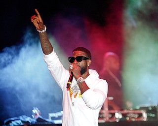 Rapper Gucci Mane performs at the Youngstown Foundation Amphitheatre for the first paid concert at the downtown entertainment venue Saturday night.