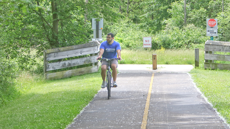 Dave Roberts of Austintown heads back to the Kirk Road trail head after hitting the end of the Great Ohio Lake to River Greenway in Mill Creek MetroParks. The 100-mile Greenway, about 80 percent of which has been built, would connect Lake Erie to the Ohio River through four counties, beginning at the lake in Ashtabula County, spanning Trumbull and Mahoning counties, and ending at the river in East Liverpool in Columbiana County. 