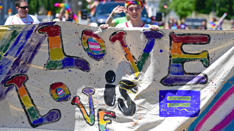 Cole White of Girard marches during the Pride parade around Courthouse Square in downtown Warren. The city hosted its first Pride parade and festival Saturday.
