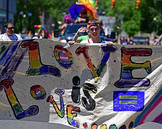 WARREN, OHIO - JUNE 22, 2019: Cole White, of Girard, marches during the Pride parade around Courthouse square, Saturday afternoon during the Pride Festival. DAVID DERMER | THE VINDICATOR