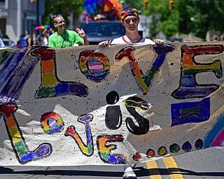 WARREN, OHIO - JUNE 22, 2019: Cole White, of Girard, marches during the Pride parade around Courthouse square, Saturday afternoon during the Pride Festival. DAVID DERMER | THE VINDICATOR
