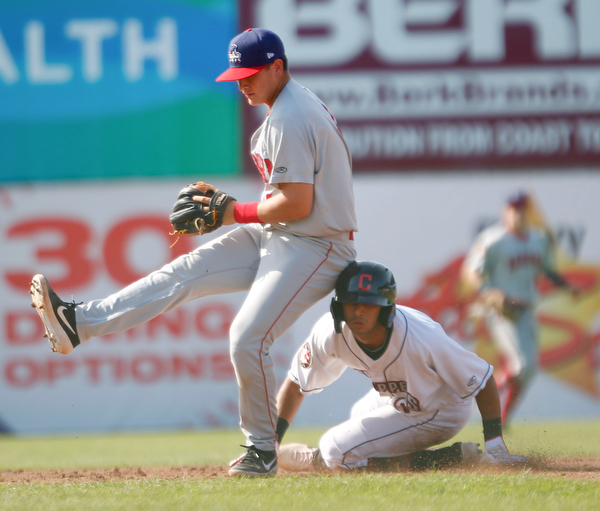 Scrappers' Brayan Rocchio slides into second as Doubledays' J.T. Arruda tries to get to the bag during their game at Eastwood Field on Sunday. EMILY MATTHEWS | THE VINDICATOR