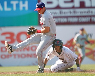 Scrappers' Brayan Rocchio slides into second as Doubledays' J.T. Arruda tries to get to the bag during their game at Eastwood Field on Sunday. EMILY MATTHEWS | THE VINDICATOR