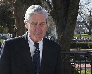 In this March 24, 2019 photo, then-special counsel Robert Mueller walks past the White House, after attending St. John's Episcopal Church for morning services, in Washington. Mueller will testify publicly before House panels on July 17 after being subpoenaed.