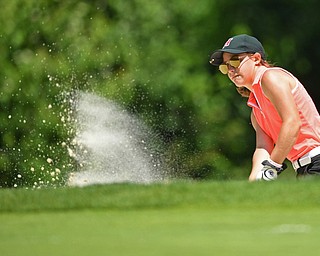 BOARDMAN, OHIO - JUNE 25, 2019: Leah Benson, of Hermitage, chips out of the bunker on the 17th hole, Tuesday afternoon during the Vindy Greatest Golfer Qualifier at Mill Creek Golf Course. DAVID DERMER | THE VINDICATOR