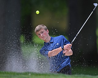 BOARDMAN, OHIO - JUNE 25, 2019: Caleb Domitrovich, of McDonald, chips out of the bunker on the 17th hole, Tuesday afternoon during the Vindy Greatest Golfer Qualifier at Mill Creek Golf Course. DAVID DERMER | THE VINDICATOR