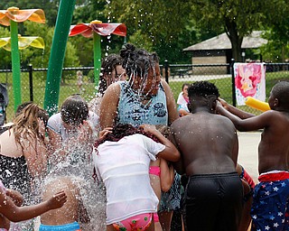 Kids play in the water at the water park in the James L. Wick, Jr. Recreation Area in Mill Creek Park on Thursday. EMILY MATTHEWS | THE VINDICATOR