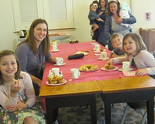 Neighbors | Jessica Harker.Families gathered to celebrate mother's day May 11 at the Austintown library's Mommy and Me for Tea event.