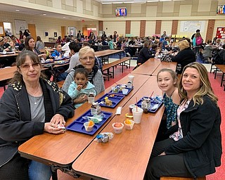 Neighbors | Jessica Harker.On May 7 community members gathered at AIS for the school's first Muffins for Mom event.