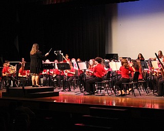 Neighbors | Abby Slanker.Cayla Conrad, Youngstown State University student teacher, conducted the Canfield Village Middle School eighth-grade band in playing “Rhythm of the Spheres” at the school’s annual Spring Concert on May 8.