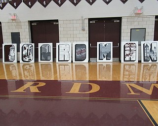 Neighbors | Jessica Harker.Boardman student members of the National Art Honors Society were commissoned to create a mural to be displayed at the Southern Park Mall.