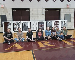 Neighbors | Jessica Harker.Boardman High School students, from left, Sam Larkin, Sophia McGee, Riley Randall, Payton Melia, Kayla Fraser, Julia Schrembeck, Marisa Melewski and Madison Ricciuti all worked to create the Boardman themed mural that will be displayed at Southern Park Mall.