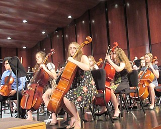 Neighbors | Jessica Harker.Seventh- and eighth-grade orchestra players performed for Boardman elementary school students on May 17.