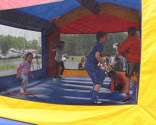 Neighbors | Abby Slanker.Hilltop Elementary School students jumped in a bounce castle to celebrate the school’s annual Student Appreciation Day on May 10.