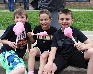Neighbors | Abby Slanker.Hilltop Elementary School third-grade students took a break from bouncing to enjoy a treat of pink cotton candy at the school’s annual Student Appreciation Day on May 10.