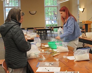 Neighbors | Jessica Harker.Poland librarian Missy Williams taught community members how to make bread dough May 20 at the library's No Need to Knead event.