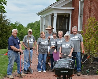 Neighbors | Submitted.Members of the Poland Historical Society Dave Zedaker, Larry Baughman, Diane Baughman, Chuck Gilbert, June Deeley, Debbie Gilbert, Laurie Fox and Mike Fox helped with landscaping outside of the Little Red School House June 2.