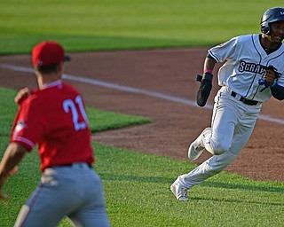 NILES, OHIO - JUNE 28, 2019: Scrappers' Korey Holland runs home to score on a RBI-triple in the first inning of their game against the Batavia Muckdogs, Friday night at Eastwood Field. DAVID DERMER | THE VINDICATOR
