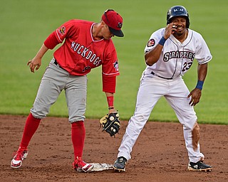 NILES, OHIO - JUNE 28, 2019: Scrappers' Billy Winn reacts after stealing second base beating a tag from Muckdogs' Andrew Turner in the third inning of their game, Friday night at Eastwood Field. DAVID DERMER | THE VINDICATOR