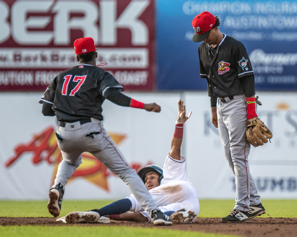 DIANNA OATRIDGE | THE VINDICATOR Mahoning Valley's Brayan Rocchio looks for the call after sliding into second base after Batavia's Dalvy Rosario (17) makes the tag and Gerardo Nunez (2) look on during their game at Eastwood Field on Saturday night.