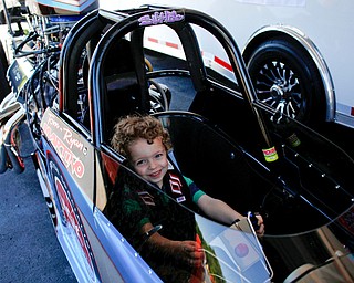 Robert "Obie" Alden, 4, of Niles, sits in PDRA world champion Tom Martino's Top Dragster at the Mahoning Valley Corvette Club's 25th Annual Corvette and Steel Car Show at Greenwood Chevrolet in Austintown on Sunday. EMILY MATTHEWS | THE VINDICATOR