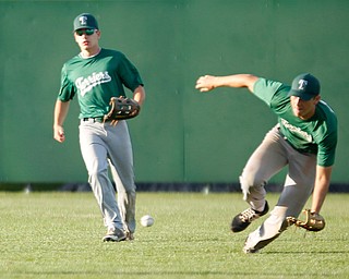 The Stark County Terriers' Alex Hawkins, left, and Tyler Urconis go after the ball during their game against the Astro Falcons at Bob Cene Park on Sunday. EMILY MATTHEWS | THE VINDICATOR