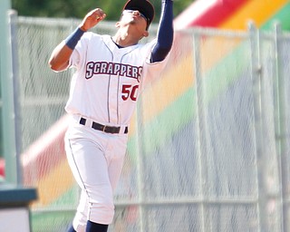 Scrappers' Jonathan Lopez catches a fly ball during their game against the Muckdogs at Eastwood Field on Sunday afternoon. EMILY MATTHEWS | THE VINDICATOR