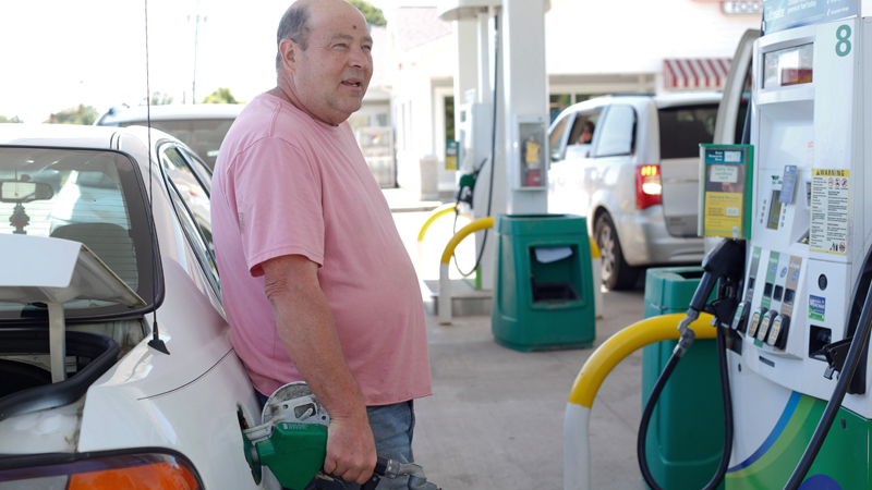 Mark Anderson of Zelienole, Pa., fills up at the Tic Toc Foods BP gas station along U.S. Route 422 in Lowellville, which charged $2.69 per gallon of regular unleaded fuel Monday afternoon. Anderson is one of several Pennsylvanians who said they skip across the state line for cheaper fuel, as Pennsylvania has the highest gas tax rate in the nation. Ohio's increased gas tax became effective Monday.
